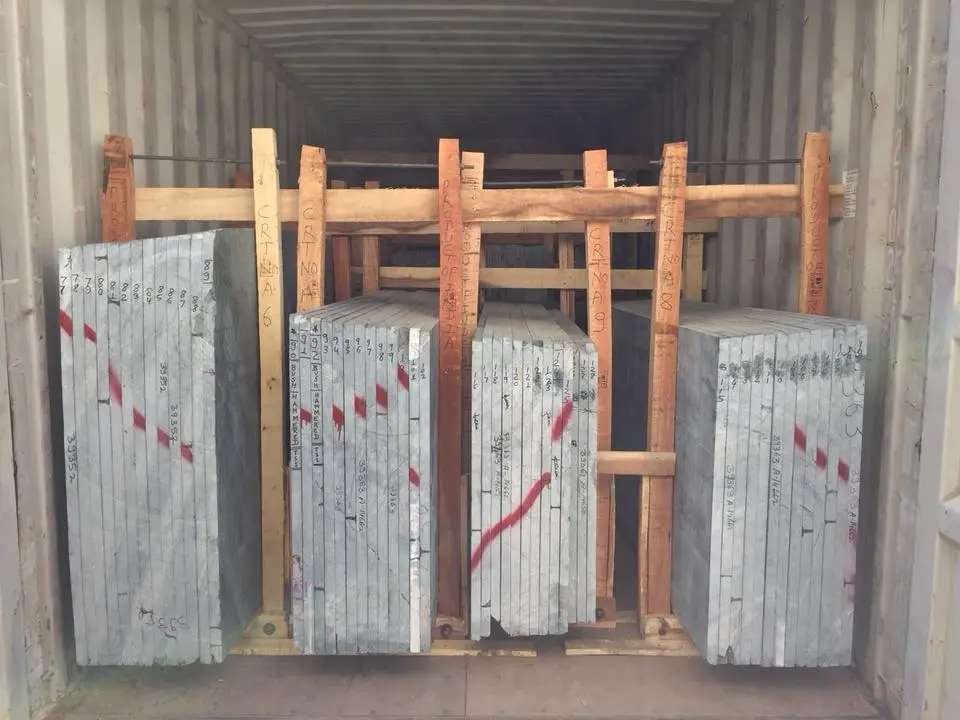 Secure packaging of slabs for export shipping